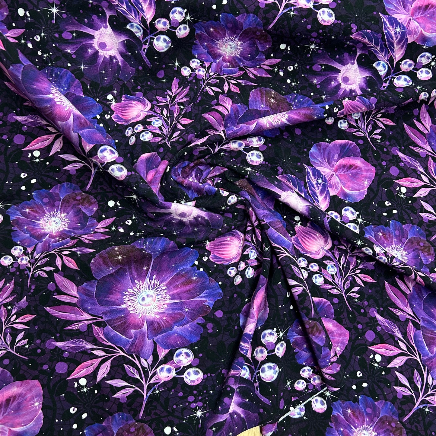 Smukke lilla sparkling blomster - Bomuldsjersey