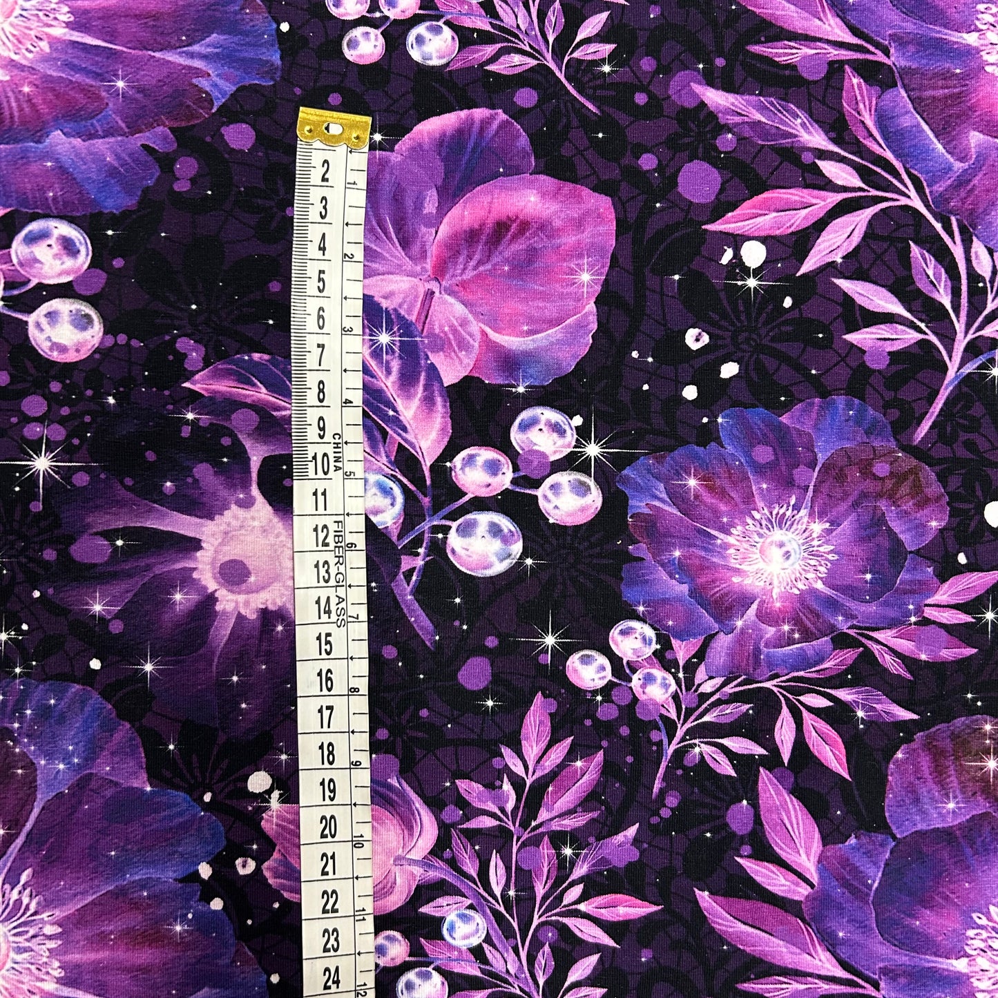 Smukke lilla sparkling blomster - Bomuldsjersey
