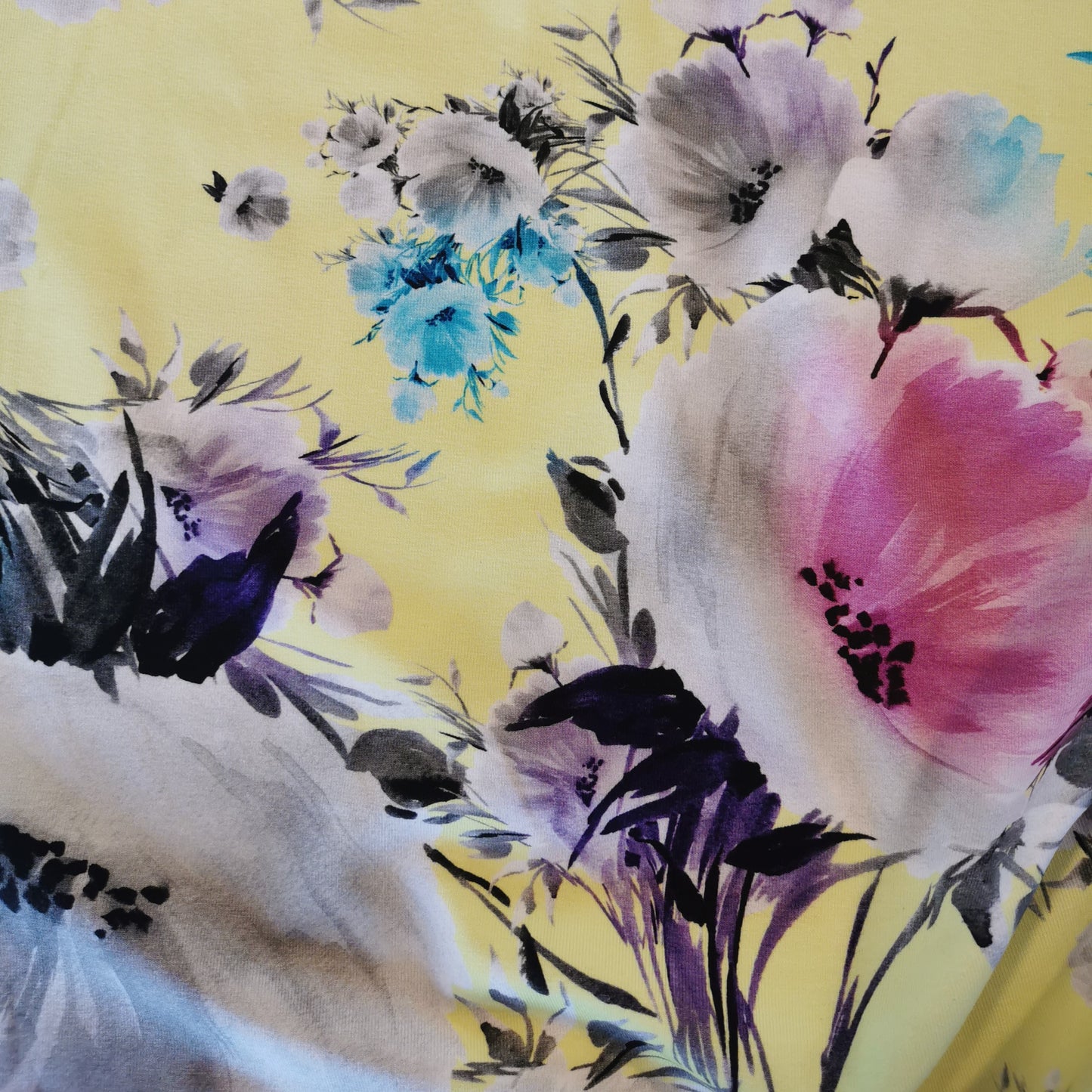 Blomster på gul baggrund - Bomuldsjersey