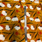 Orange baggrund med hvide blomster - Viskose
